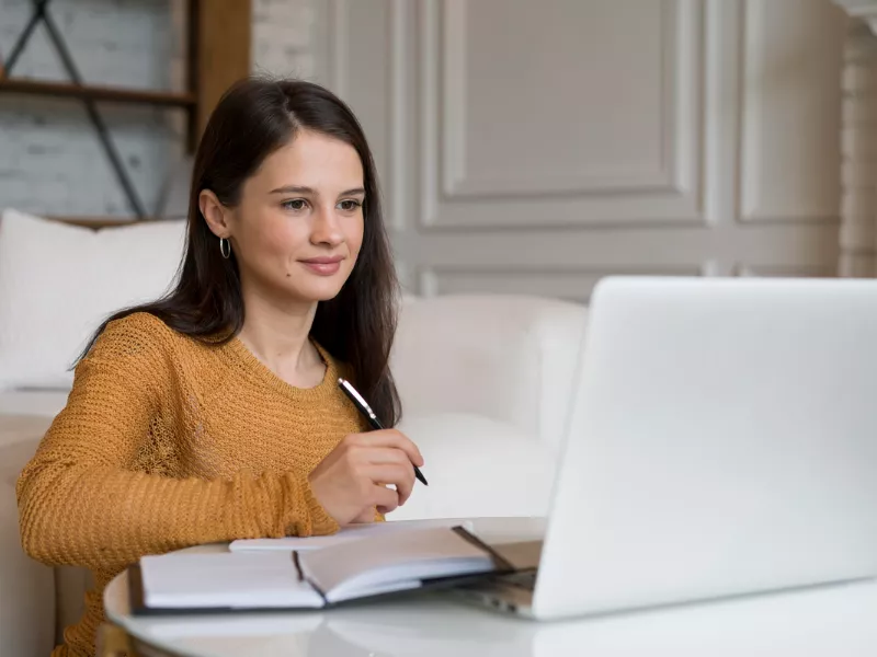 Student exploring grade guarantee vs money-back guarantee for online class support
